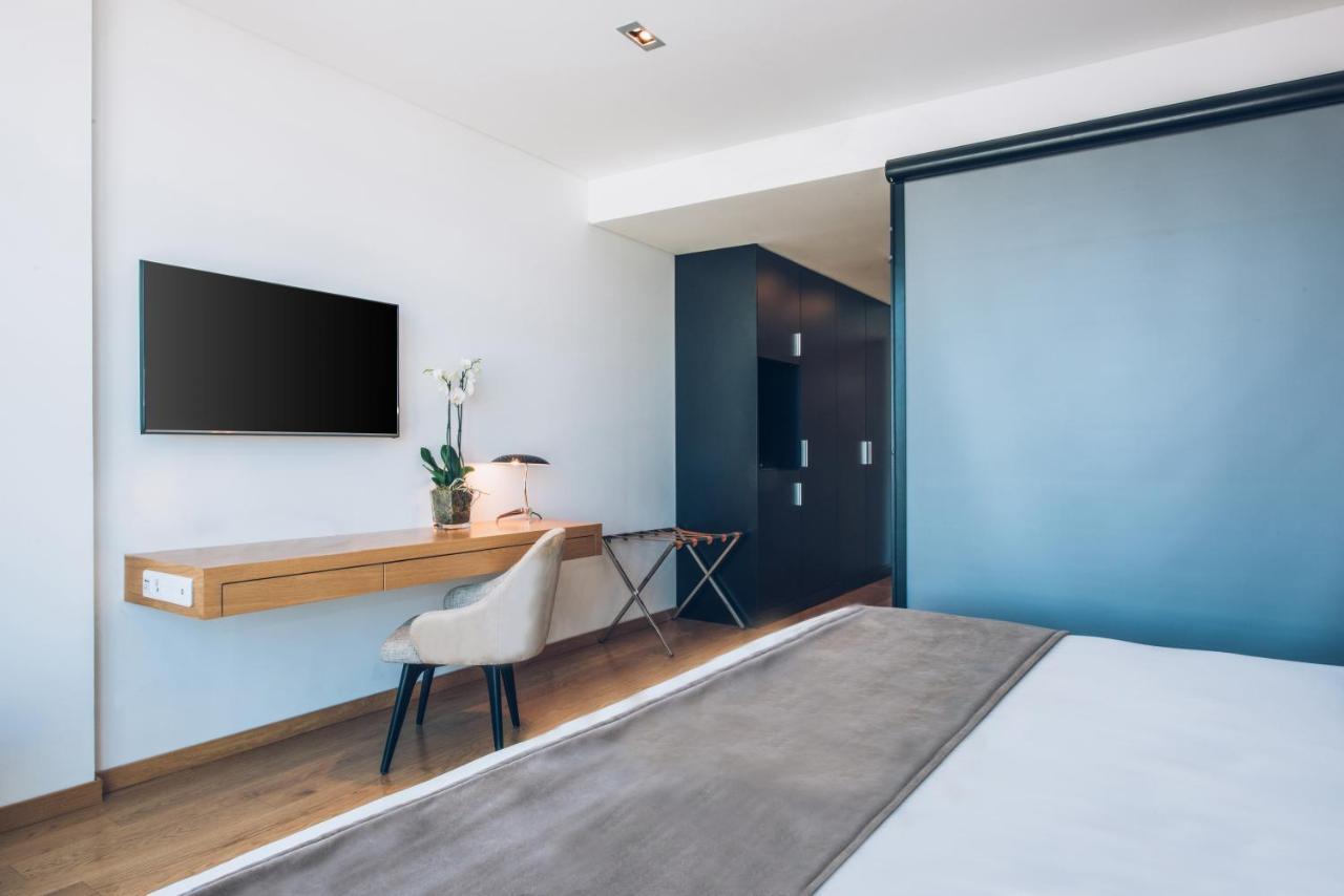 อิเบโรสตาร์ ซีเล็คชัน ลิสบัว Hotel ลิสบอน ภายนอก รูปภาพ A room at the hotel