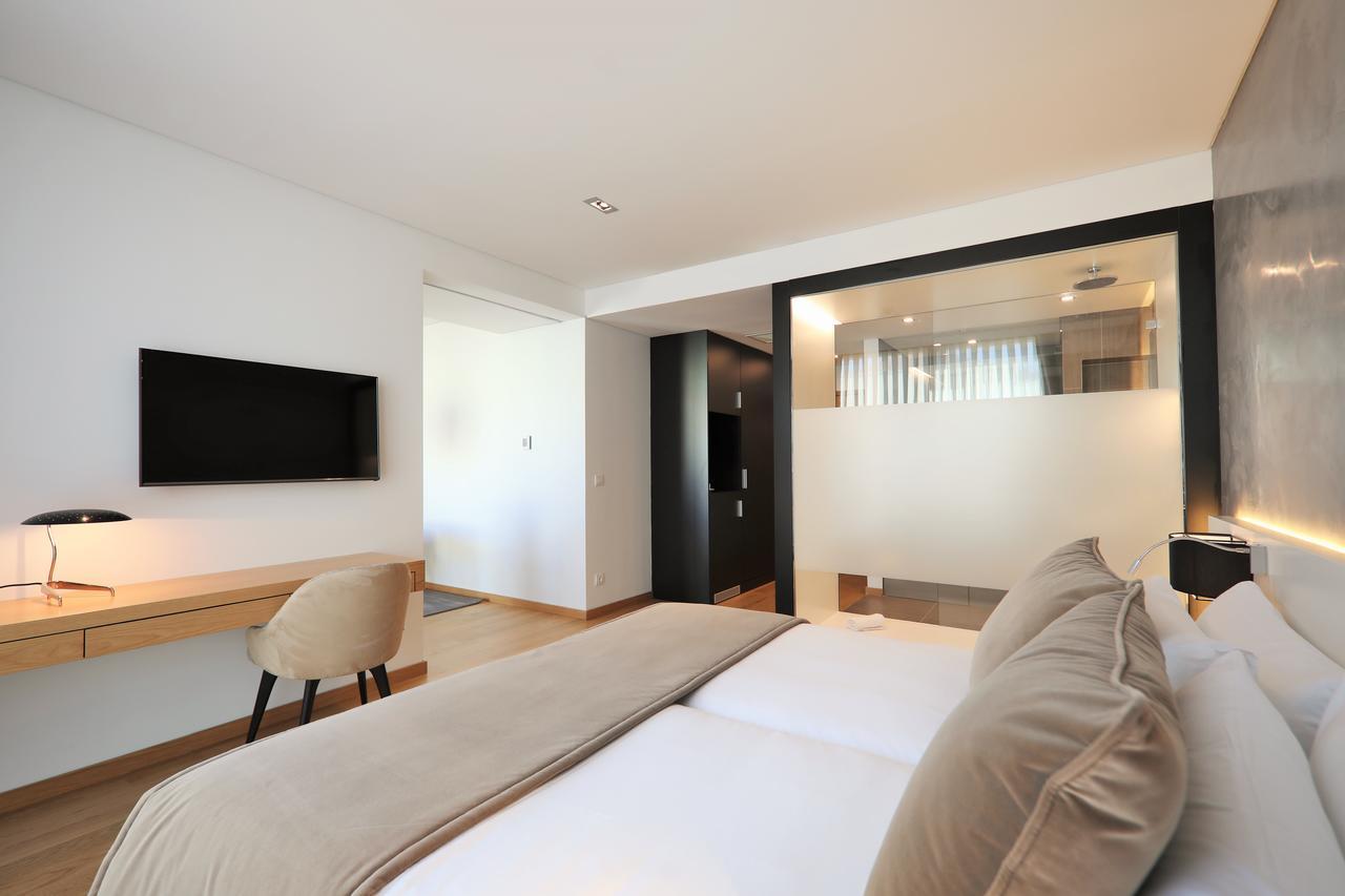 อิเบโรสตาร์ ซีเล็คชัน ลิสบัว Hotel ลิสบอน ภายนอก รูปภาพ A room at the hotel