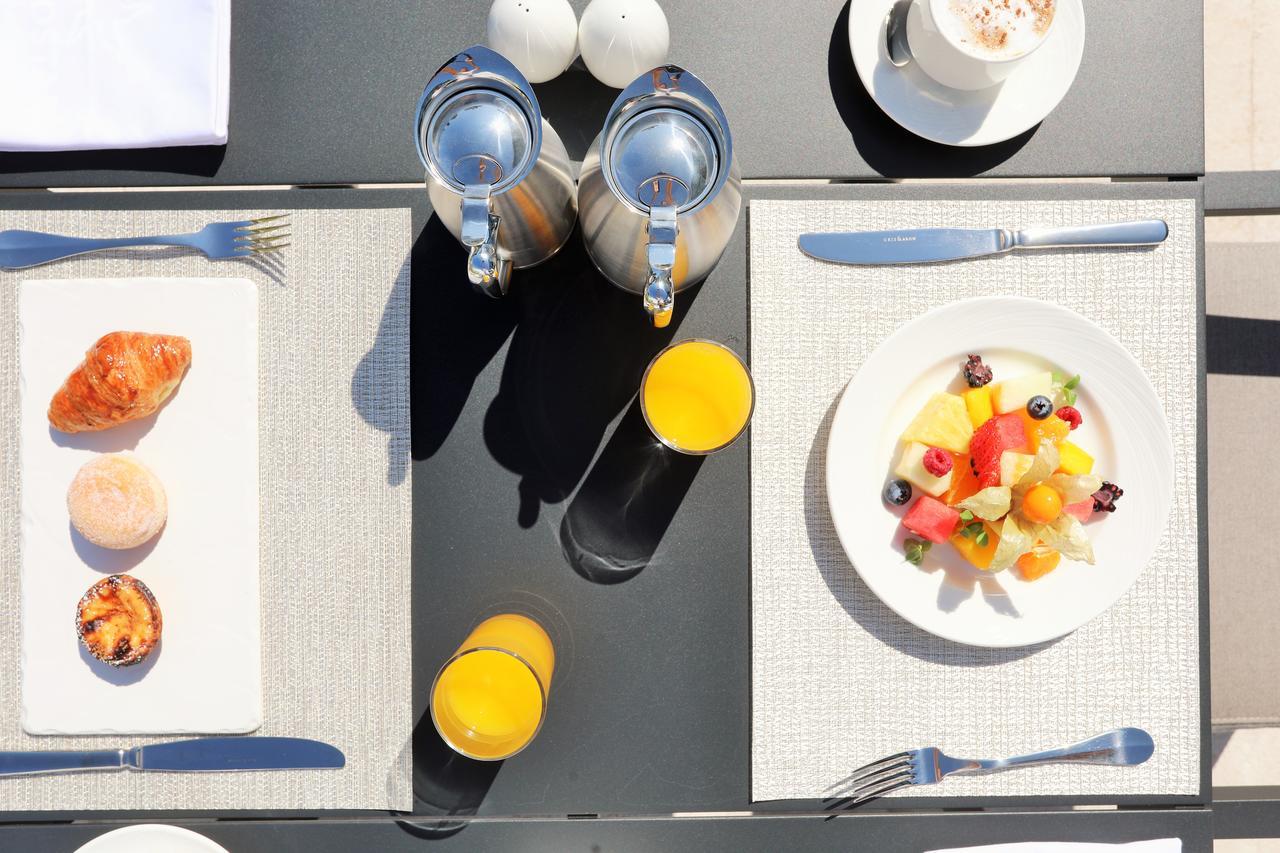 อิเบโรสตาร์ ซีเล็คชัน ลิสบัว Hotel ลิสบอน ภายนอก รูปภาพ A place setting